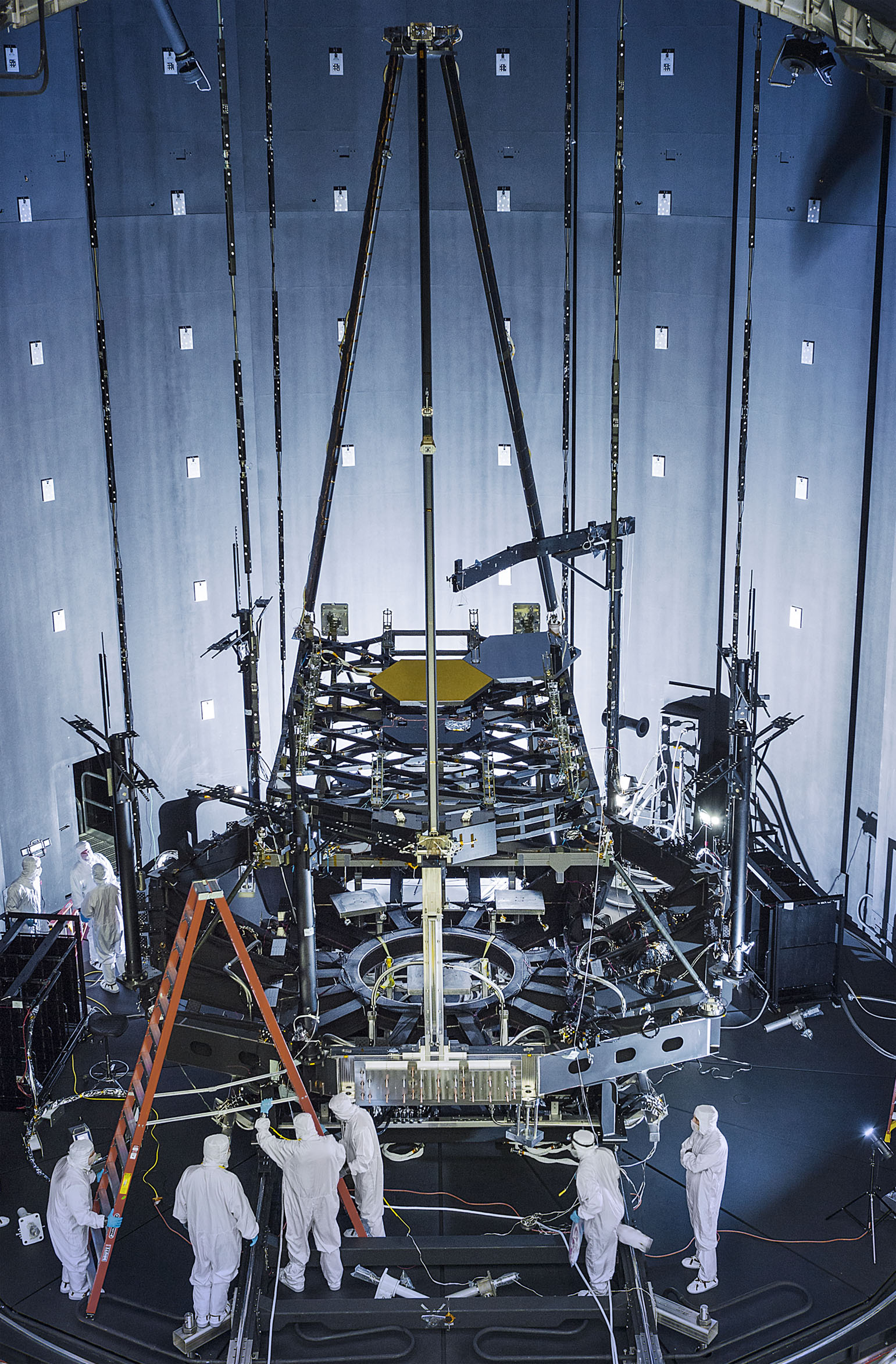 A Johnson Space Center release dated Aug. 7 describes spacesuits and moving mechanisms being evaluated in vacuum chambers with simulated regolith. NASA's own Inspector General has projected the next-generation suit demonstrations could slip to 2031.